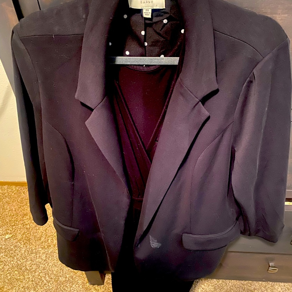 Soft black blazer for plus size woman.